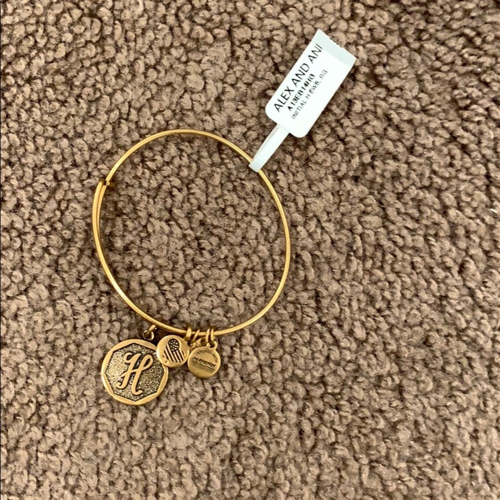 Gold H Alex and Ani bracelet
